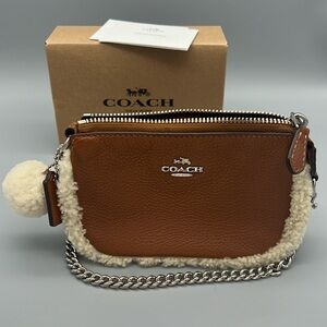 Coach leather mini bag, tan shearling